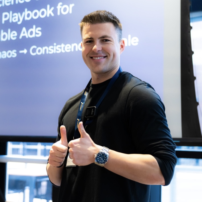 Mac, founder of PartnerGrowth, at a marketing conference